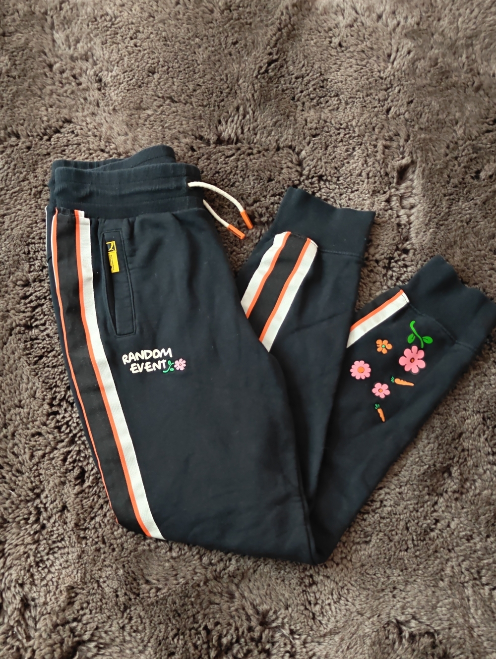 Puma Black Joggers with Pink Floral Embroidery and Orange Stripe
